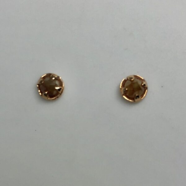 Stud earrings with gold detailing