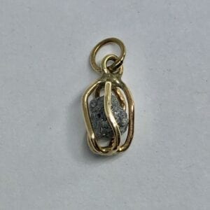 Diamond pendant with gold detailing