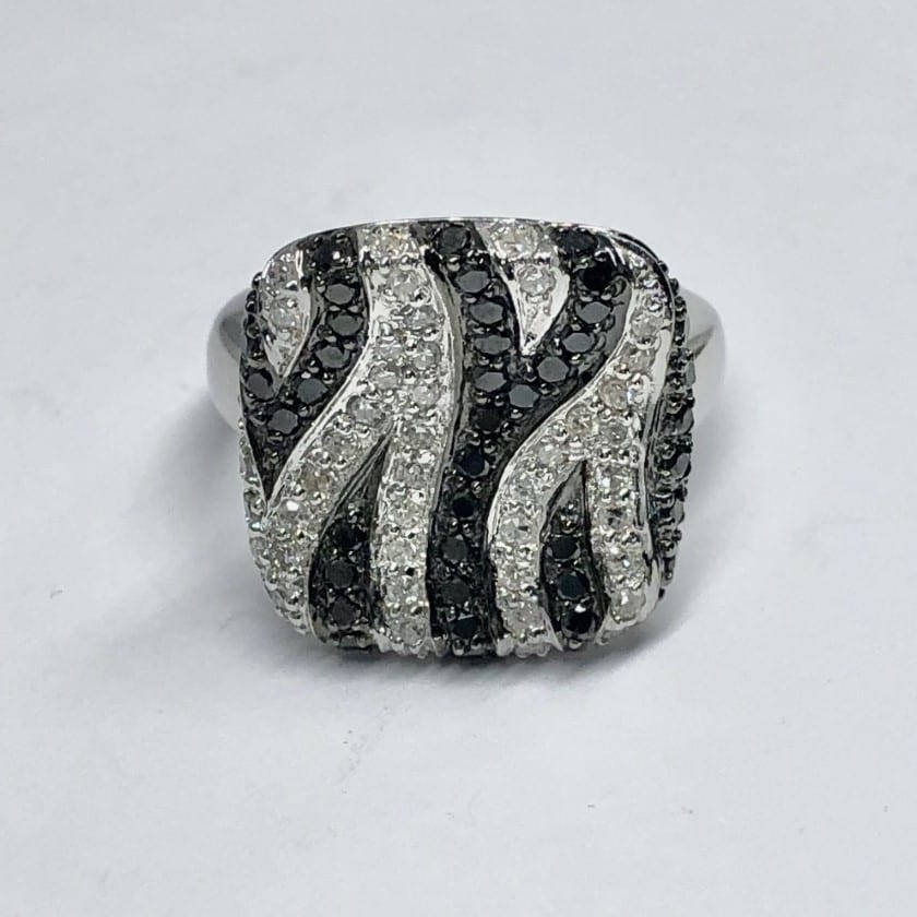 Black and white diamond ring in swirl patterns