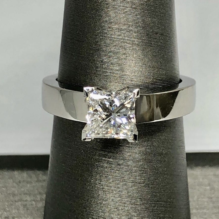 Closeup square diamond with shining band