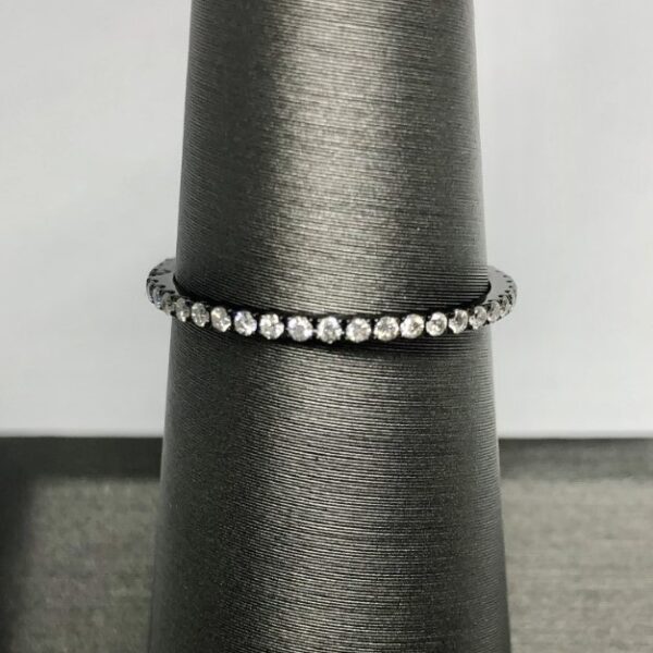 Black ring with many small diamonds