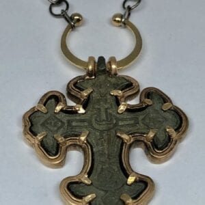 Gold cross pendant