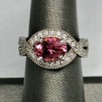 pink tourmaline gem around diamond ring